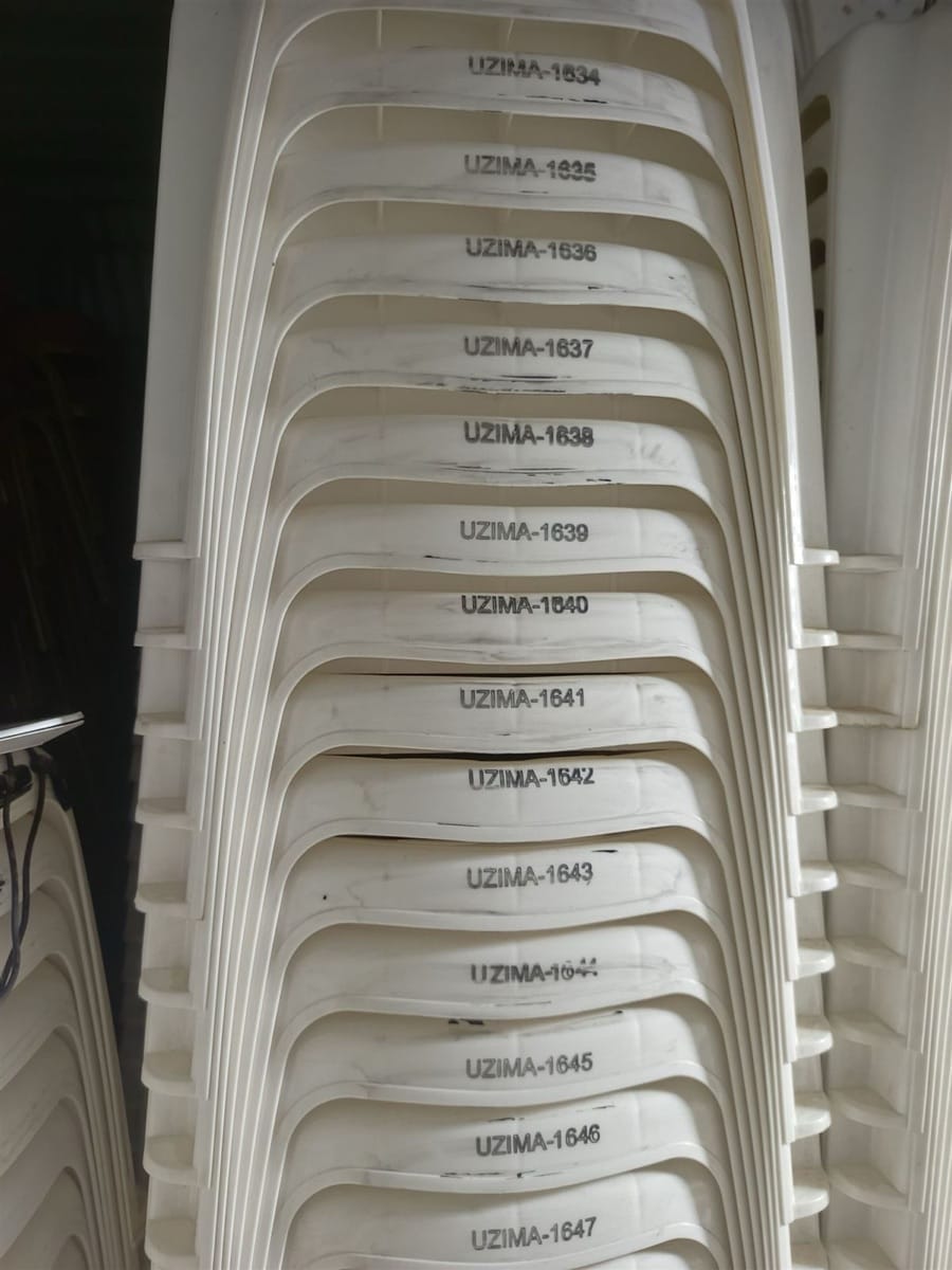 Freshly laser-engraved metal pet tags and custom gifts