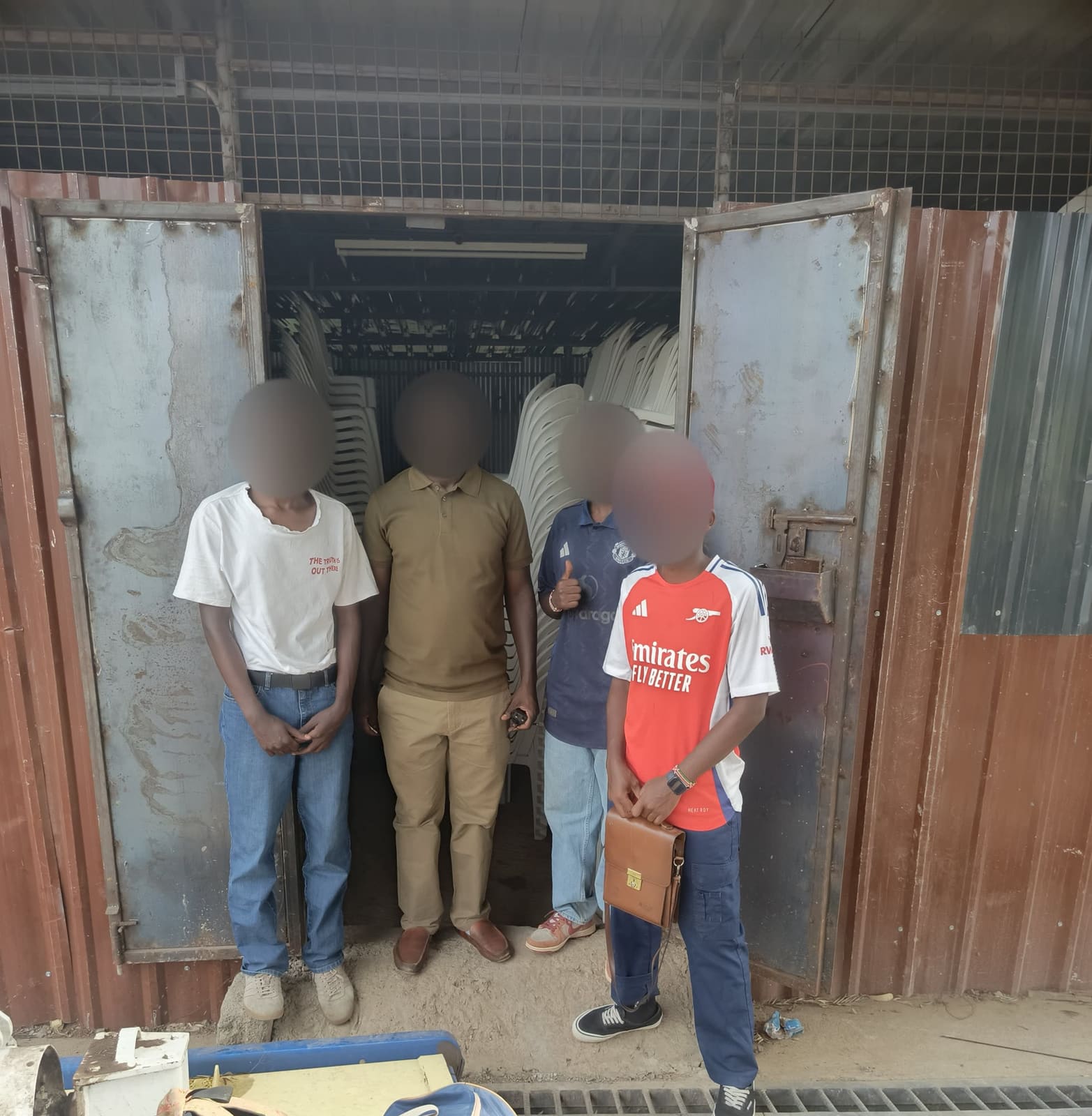 Uzima University client satisfaction - team with client after project completion